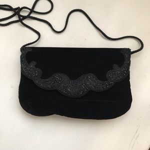 Black velour over the shoulder clutch beaded front